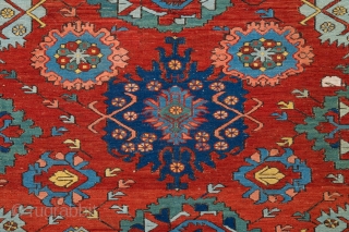 Caucasian 1860s Zeikhur sumakh Complex small-pattern repeat of octagons, eight-pointed stars, palmettes, rosettes and many abstract animals is arranged symmetrically around the vertical axis of the red-ground field. The design reminiscent of  ...