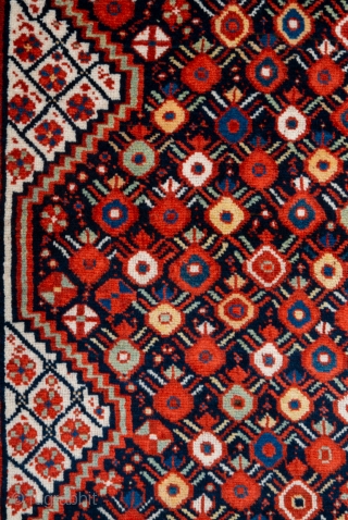 Second half 19th century South West Persian,Khamseh Rug
This very beautiful Khamseh woven by a Baharlu/Ainalu tribal group features a dense repeat of pomegranates in brilliant and diverse colours against a midnight blue  ...