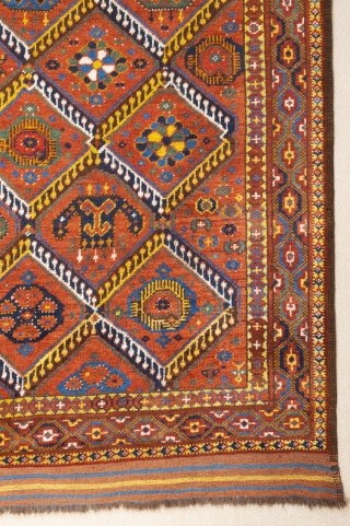 Middle of 19th Century,Central Asia, central Amu Darya valley Beshir ıkat design rug.An antique Beshir showing a diamond design; flowers, palmettes and botehs alternate in the various compartments. –The original kilim finishes  ...