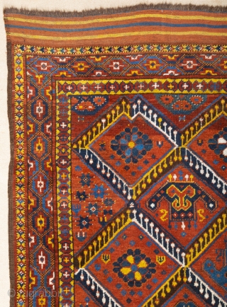 Middle of 19th Century,Central Asia, central Amu Darya valley Beshir ıkat design rug.An antique Beshir showing a diamond design; flowers, palmettes and botehs alternate in the various compartments. –The original kilim finishes  ...