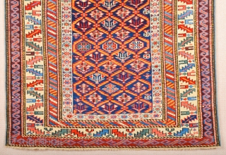 A blue-ground Kuba displaying a lattice design of yellow serrated leaves enclosing flowering shrubs. Mid 19th Century Shirvan Kuba Rug It has a nice pile on it. Lovely colors Size 110 x  ...