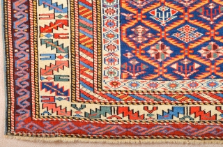 A blue-ground Kuba displaying a lattice design of yellow serrated leaves enclosing flowering shrubs. Mid 19th Century Shirvan Kuba Rug It has a nice pile on it. Lovely colors Size 110 x  ...