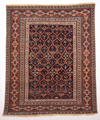19th Century Unusual Small Shirvan Kuba Rug.With Great Border And It Has Really Good Quality.Thin One.The Ground Is Deep Blue Not Black.It's In Good Condition.Size 110 x 130 Cm
    
