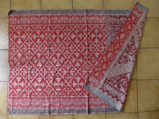 Songket, supplemental weft. Kre Alang, Sumbawa, Silver Thread. 1930 or older. Minor stain (betel?) in one area. (The tiles in the photo are 12" x 12".)       