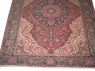 Heriz Persian knotted circa 1915 antique, 340 x 266 cm 
 carpet ID: ERB-1
The black knots are oxidized, the knots are hand spun lamb, the background color is terracotta, the center medallion  ...