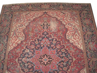 Heriz Persian knotted circa 1915 antique, 340 x 266 cm 
 carpet ID: ERB-1
The black knots are oxidized, the knots are hand spun lamb, the background color is terracotta, the center medallion  ...