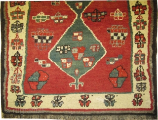 


Gabbeh Nomad, knotted circa in 1928, old, collector's item. 188 x 130 (cm) 6' 2" x 4' 3"  carpet ID: T-711
The knots are hand spun wool, the warp and the weft  ...