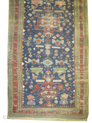Sejshour Kouba Caucasian antique, 330 x 123 (cm) 10' 10" x 4' carpet ID: K-3461
The knots, the warp and the weft threads are hand spun wool, the black color is oxidized, certain  ...