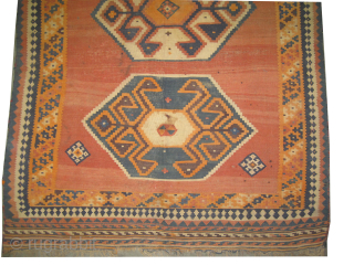 

Qashqai Kelim Persian, woven circa 1930, 145 x 224 cm, ID: SA-1608
Vegetable dyes, the orange is synthetic, woven with hand spun 100% wool, the background color is rust, the center three medallions  ...