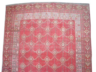 Samarkand knotted circa 1925, antique, 200 x 398 cm.
 The knots are hand spun wool, all over geometric design, the background color is tomato red, at the background certain places the  ...