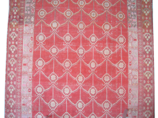  Samarkand knotted circa 1925, antique, 200 x 398 cm.
 The knots are hand spun wool, all over geometric design, the background color is tomato red, at the background certain places the  ...