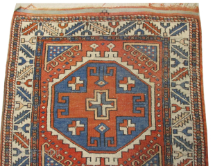 Bergama Turkish, knotted circa 1895 antique, 79 x 146 cm
Signed, thick pile, the knots are hand spun wool, vegetable dyes, the black knots are oxidized, ivory border, rust background.    