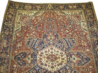 

Serapi-Herriz Persian knotted circa 1918 antique, 314 x 256 cm,  ID: P-5400
The black knots are oxidized, the knots are hand spun wool, the background color is brick, the center medallion is  ...