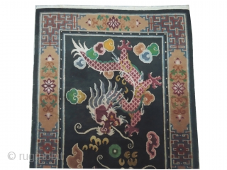 Tibetan dragon rug, knotted circa in 1935, semi antique, 118 x 205 cm, carpet ID: BRDI-37
The knots are hand spun wool, the background in indigo with two dragons, thick pile in perfect  ...