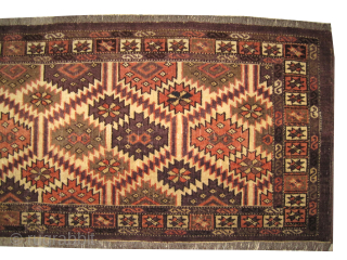

Yemouth Turkmen knotted circa 1885 antique, collectors item, 41 x 125 cm, ID: MMM-52
Vegetable dyes, the black knots are oxidized. The knots, the warp and the weft threads are hand spun wool  ...