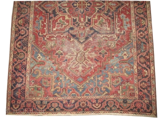 Heriz Persian knotted circa in 1915 antique, 304 x 206 
 carpet ID: P-5244
The black knots are oxidized, the knots are hand spun wool, the background color is terracotta, the center medallion  ...