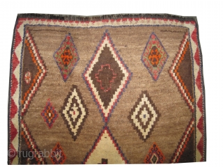  	

Gabbeh Louri Persian circa 1910 antique, collector's item, Size: 173 x 110 (cm) 5' 8" x 3' 7"  carpet ID: T-721
the knots are hand spun wool, the shirazi borders are  ...