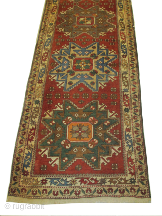 Kazak, old, 99 x 385 cm, ID: SSH-4
The knots, the warp and the weft threads are 100% wool, part of one border is damaged.         