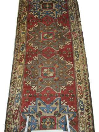 Kazak, old, 99 x 385 cm, ID: SSH-4
The knots, the warp and the weft threads are 100% wool, part of one border is damaged.         