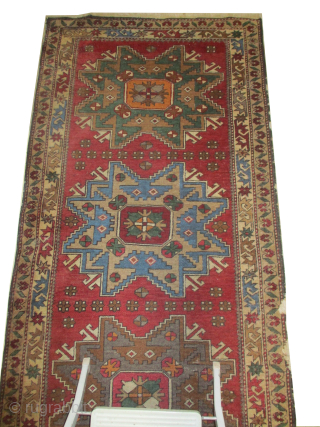 Kazak, old, 99 x 385 cm, ID: SSH-4
The knots, the warp and the weft threads are 100% wool, part of one border is damaged.         