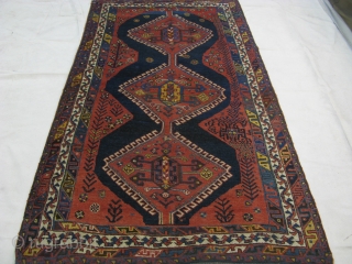 Persian nomadic Luri, late 19th century, all wool, natural vegetable dyes, rewoven on both ends for 4 cm, gallery rug. size c. 280x140 cm.         