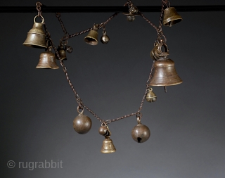 Old chain of bells and grelots,
shamanic culture of Nepal.
The shaman places two of these chains across the shoulders.               