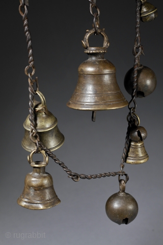 Old chain of bells and grelots,
shamanic culture of Nepal.
The shaman places two of these chains across the shoulders.               