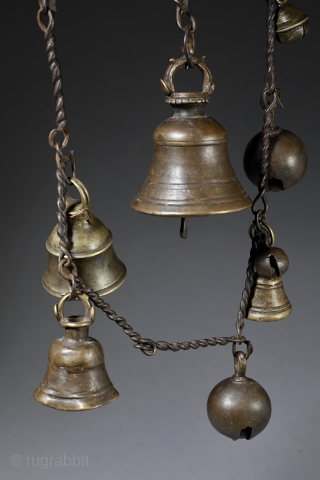 Old chain of bells and whistles,
shamanic culture of Nepal.
The shaman places two of these chains across the shoulders.               