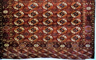 Tekke main carpet, thin and supple weave, like velvet, floppy and fine quality like a torba, some silk knots, some wear. Two very small repairs about 2 sq in. (10 sq cm)  ...