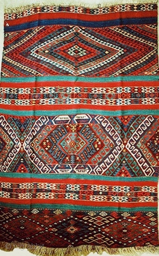 AVAILABLE -- A choice and small flat-woven kilim with exceptional saturated natural colors and showing several variations of mixed-weaving techniques. Striking wall-hanging display piece. It is about 3.6 x 5.0 feet (104  ...