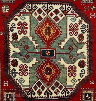 AVAILABLE An outstanding antique Kazak in an unusual kelleh format, 6.1 x 11.10 feet; 19th century. All natural colors, including aubergine purple highlights. Lustrous wool, excellent pile and the ends and selvages  ...