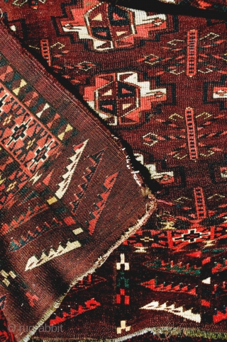This large and deep Turkmen chuval has many characteristics of an early collectible piece: lots of offset symmetric knotting, spacious drawing with nicely shaped guls, saturated aubergine/brown red ground, apricot-rose madder dye,  ...