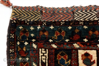 A finely woven chanteh, Qashqa'i or Khamseh, with a pattern of traditional textiles, termeh, last quarter 19c, with soft, fat pile.            