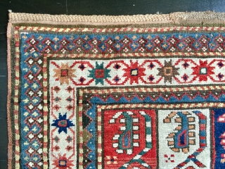 Origin and description: Carpet of Caucasian origin, taking in traditional stylized motifs the "boteh" in the central field and a chain of stars in the main border. The "boteh" evokes by its  ...