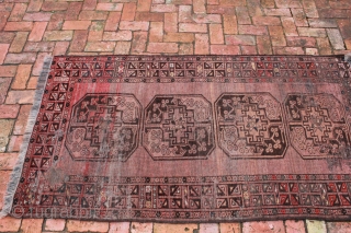 This is an Afghan rug with elephant feet decoration.  This type of rug is sometimes referred to as 'Afghan Gold'.
Circa the last quarter of the 19th century.  The rug shows  ...