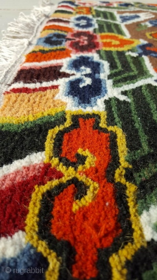 This unique carpet was specially spun during the Footok Festival, which revolves around the 450 year old Tibetan monastery of Olangchung Gola in the Kanchenjunga area of Nepal. The handcraft uses purely  ...