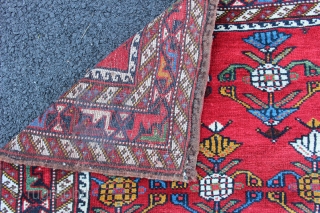 Afshar inspired Khamseh pomegranite rug. 19th century to 1900. Size 3'8" x 2'8". Both endings and sides complete. One end with sumack finish. This is a small format rug not a bagface.  ...