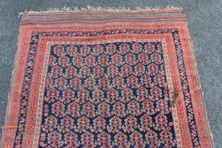 Afshar Neriz Main Rug 4'9" x 9'6". Third to fourth quarter Nineteenth Century. There is a sewn tear on one kilim end. There is one fold wear. There is one old stain.  ...