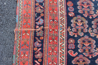 Afshar Neriz Main Rug 4'9" x 9'6". Third to fourth quarter Nineteenth Century. There is a sewn tear on one kilim end. There is one fold wear. There is one old stain.  ...