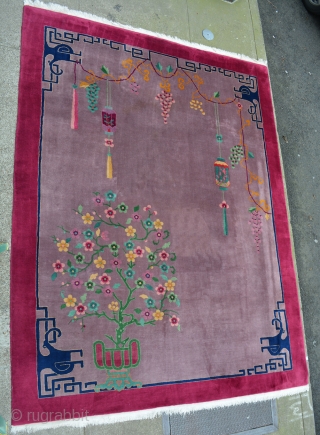 Exceptionally beautiful and unusual 1920's Art Deco Chinese 8'3" x 11', mint condition, natural dyes, thick soft Mandarin quality wool with rare tree and dragon's head motifs design. Pale lavender field with  ...