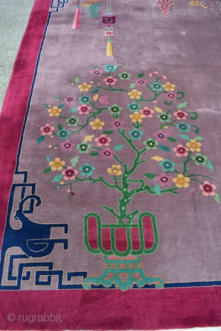 Exceptionally beautiful and unusual 1920's Art Deco Chinese 8'3" x 11', mint condition, natural dyes, thick soft Mandarin quality wool with rare tree and dragon's head motifs design. Pale lavender field with  ...