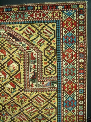 GREAT RARE YELLOW FIELD ANTIQUE CAUCASIAN MARASALI SHIRVAN PRAYER RUG

Classic textbook design with 100% natural dyes. It possesses evenly low allover pile condition to the tops of the knots. Minor repairs to  ...