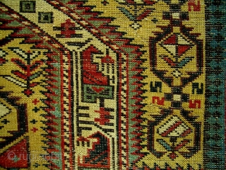 GREAT RARE YELLOW FIELD ANTIQUE CAUCASIAN MARASALI SHIRVAN PRAYER RUG

Classic textbook design with 100% natural dyes. It possesses evenly low allover pile condition to the tops of the knots. Minor repairs to  ...