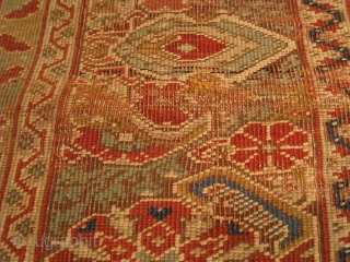 A mid-19th Century Ghiordes Prayer Rug, 5'5" x 4'0".  Great color with traditional pattern.  Reselvedged, flat-stitch repairs, and normal wear associated with rugs from this period.     