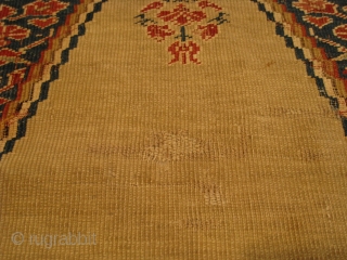 A mid-19th Century Ghiordes Prayer Rug, 5'5" x 4'0".  Great color with traditional pattern.  Reselvedged, flat-stitch repairs, and normal wear associated with rugs from this period.     