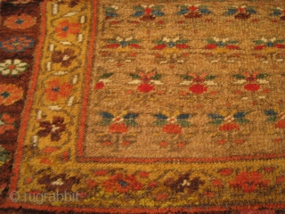 A late 19th Century Kurdish rug, 4' 10" x 3' 7".  Additional images and detailed condition report AOR.              