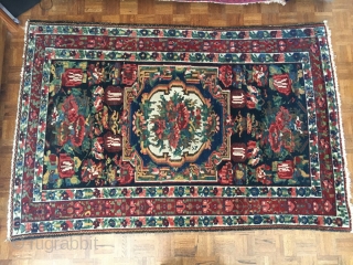 Bakhtiari Gol Farang "Foreign Flower" decorative rug. 7'X 4'-5". Very good condition with good pile. All the colors of the rainbow with no harsh colors. A decorator's delight! Minor end loss, secured,  ...