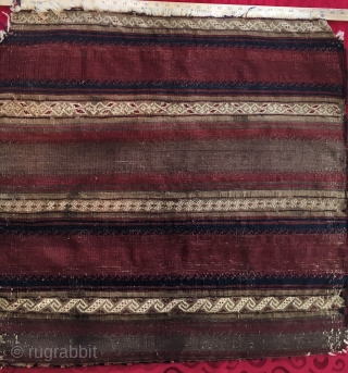 Baluch bag, with stellar back. Several weaving forms present. Older than dirt. Great drawing and color. Not full pile but complete. $550           