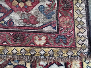 Sold Antique Bakhtiari rug with natural dyes and all wool foundation. Areas of wear and a crease or two. No holes, or smells. About 5' X 4'. Has a small faded area  ...