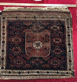 Ancient Baluch bag, with intricate back. 34" wide, 38" tall. Good condition. The pile was never very high to begin with! Some loss of pile due to brown corrosion. Acquired from Tom  ...